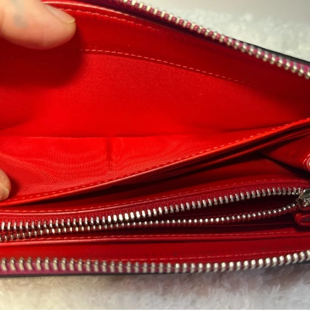 Christian Louboutin Zip Around Panetone Studded wallet in Wine Color, Leather